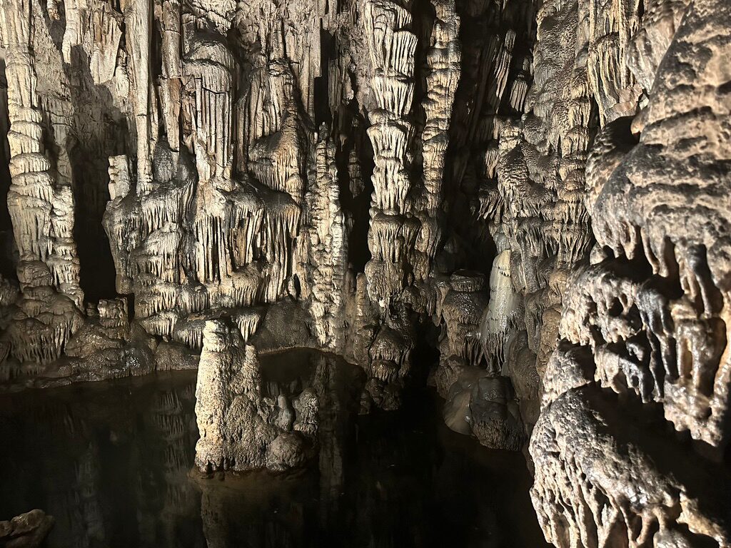 Inside the Cretan cave where, in myth, Zeus was born: stalactites, stalagmites and a still underground pool.